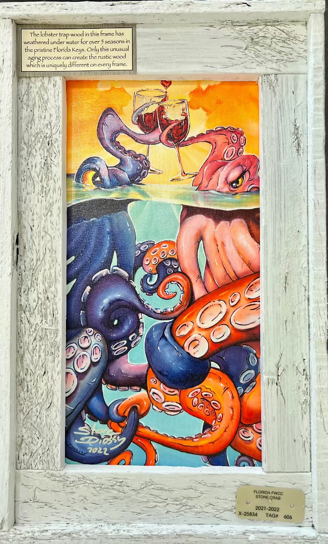 A framed mini canvas artwork featuring marine life with an abstract and colorful style, signed by Steve Diossy, with a white wash finished frame.
